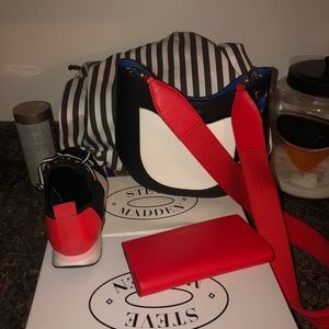 Henri bendel Crossbody bag with matching wallet.